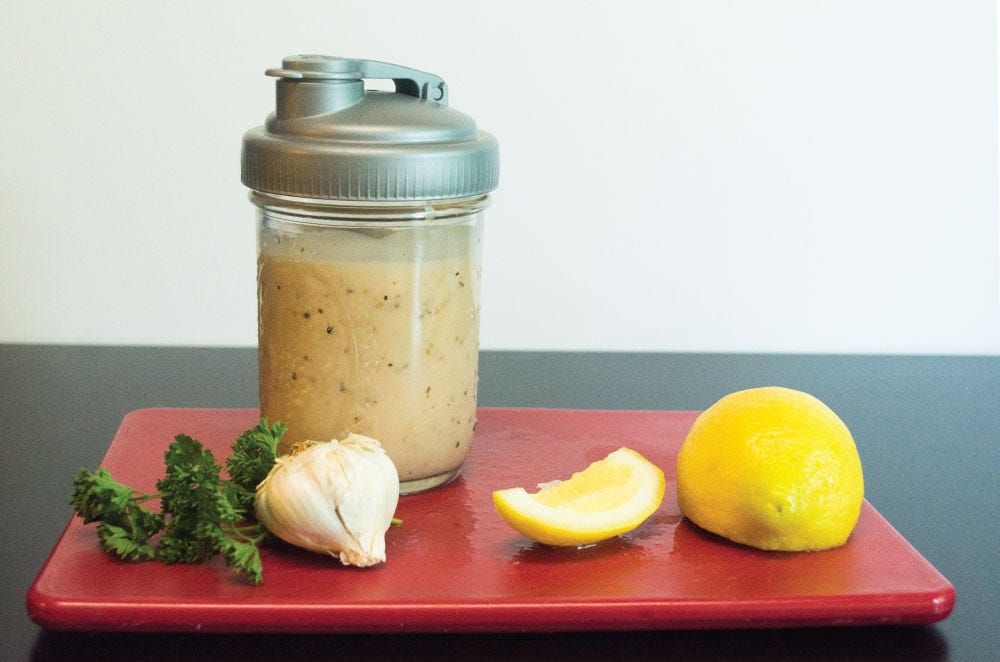 Dijon, garlic, and lemon marinade in mason jar